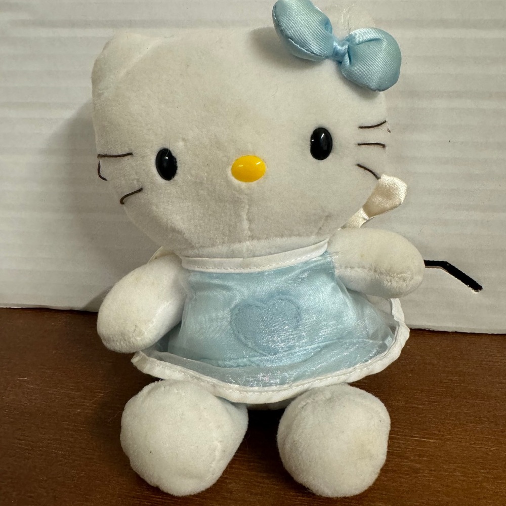Cute White Plush Toy with Blue Dress